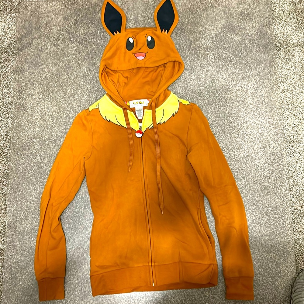 Brand new  ( no tag) zip up hoodie with side pockets. Women size small.